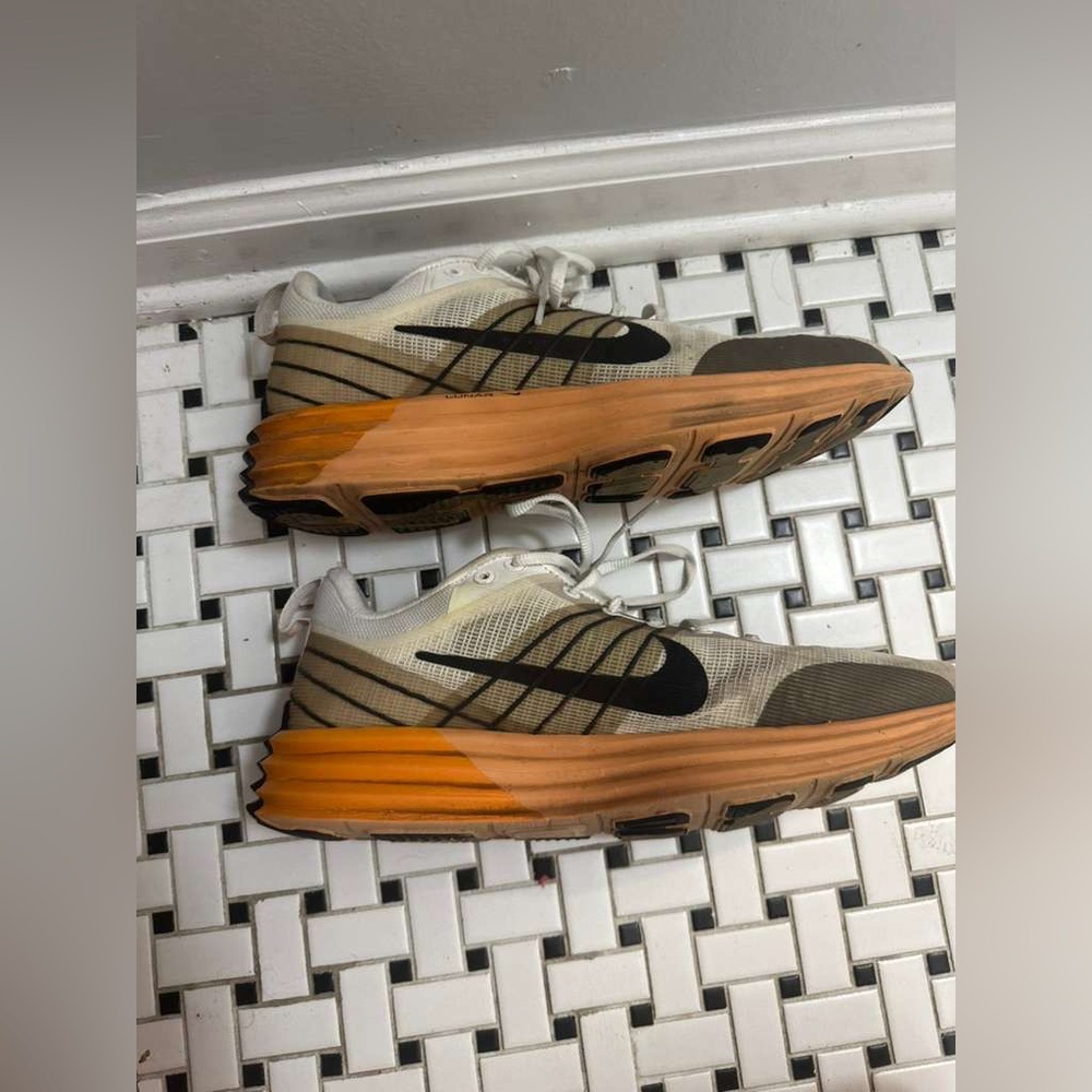 Nike Cream and Orange Running Shoes
